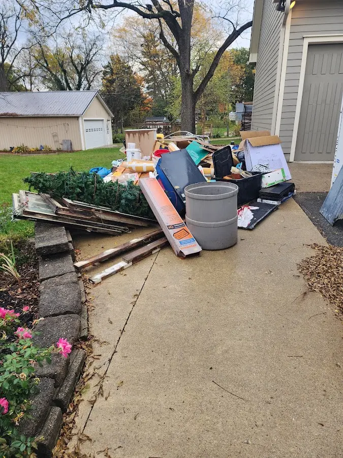 Dumpster being loaded with debris for Roofing Dumpster Rental in Vancouver